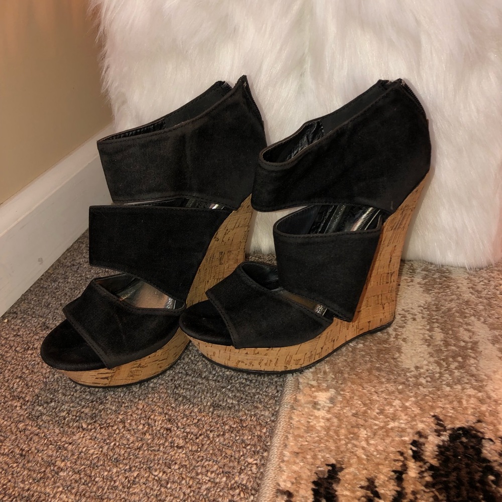 Women’s black wedge heels Size 6